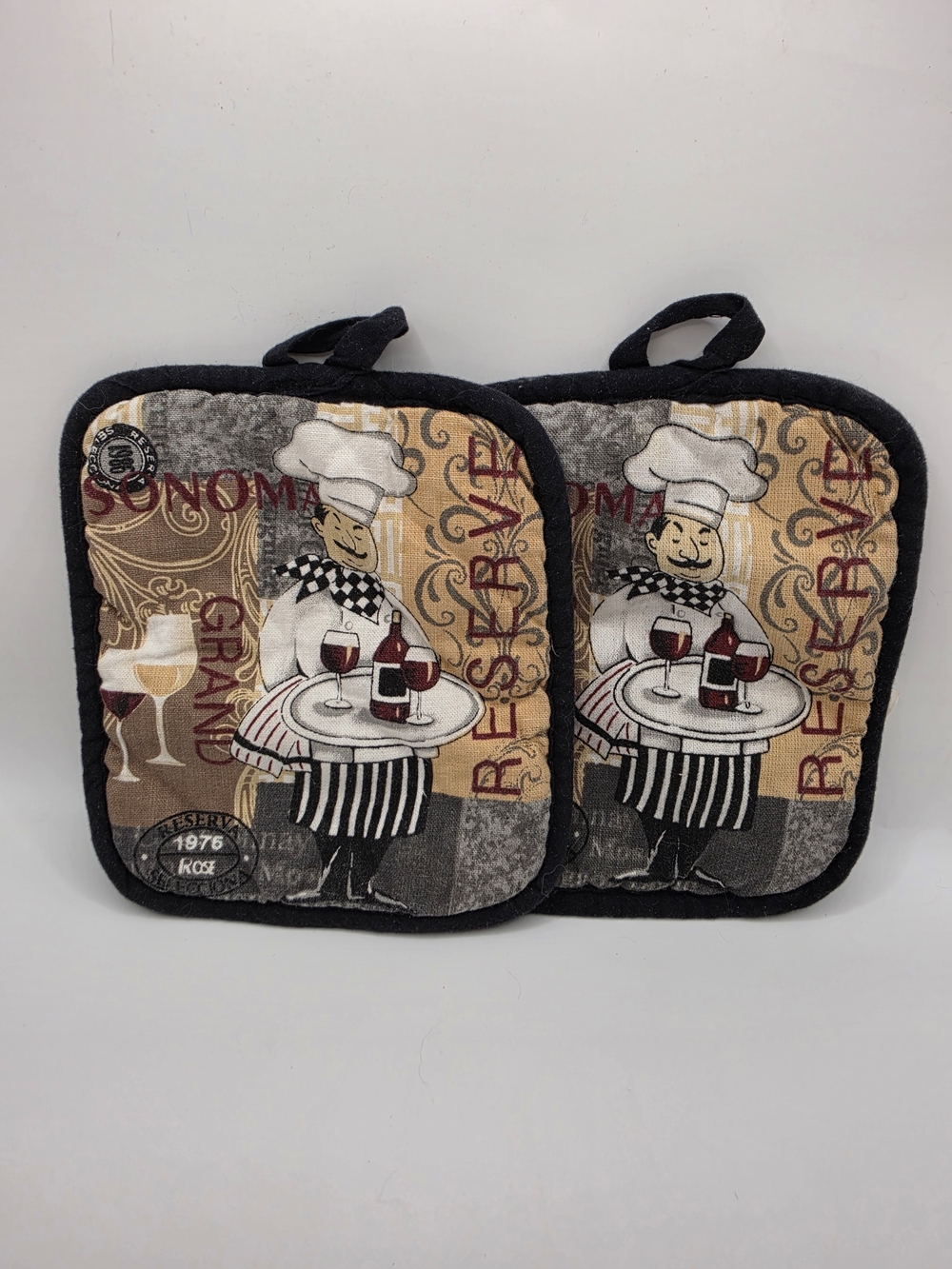 America Mills Tan, Black and Cream Fat Chef Potholder Pair with Wine Design